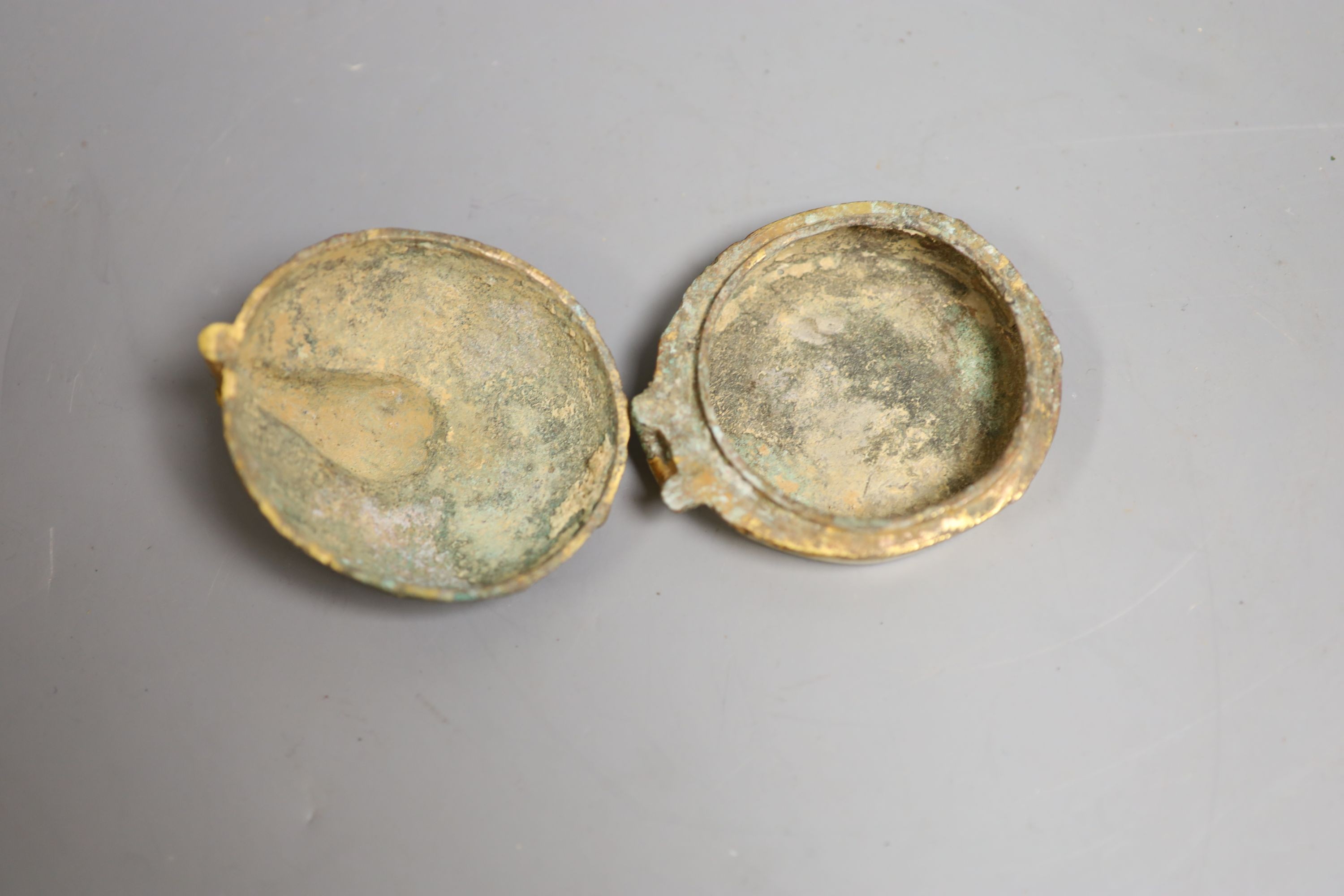 A Chinese gilt bronze elephant charm box, base 7cm diameter